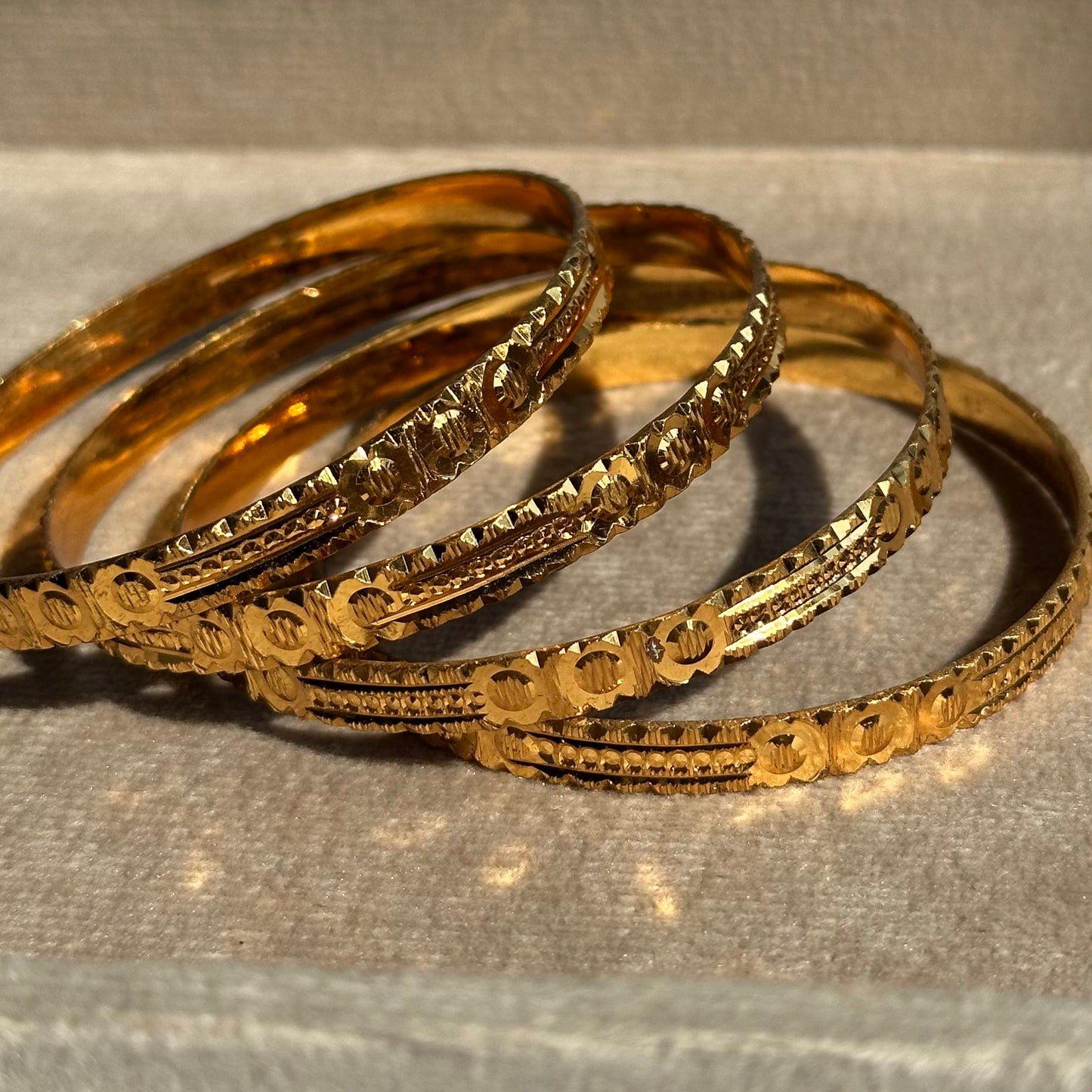 4-Piece Gold Textured Diamond Cut Bangle Set