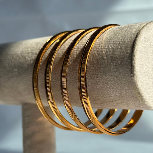 4-Piece Gold Line-Textured Bangle Set