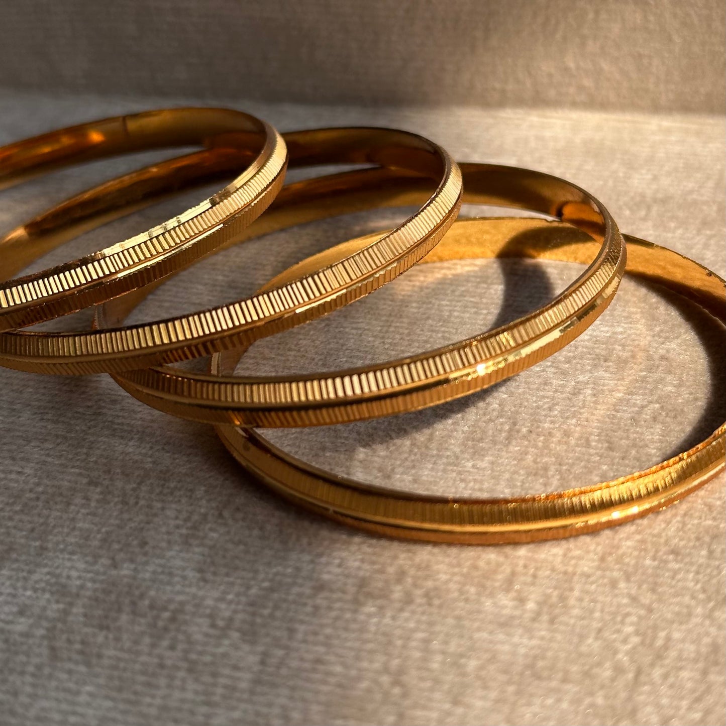 4-Piece Gold Line-Textured Bangle Set