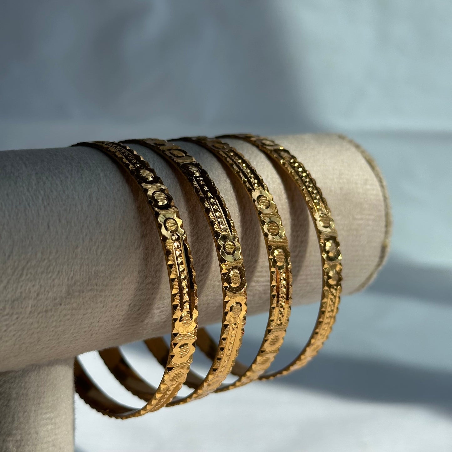 4-Piece Gold Textured Diamond Cut Bangle Set
