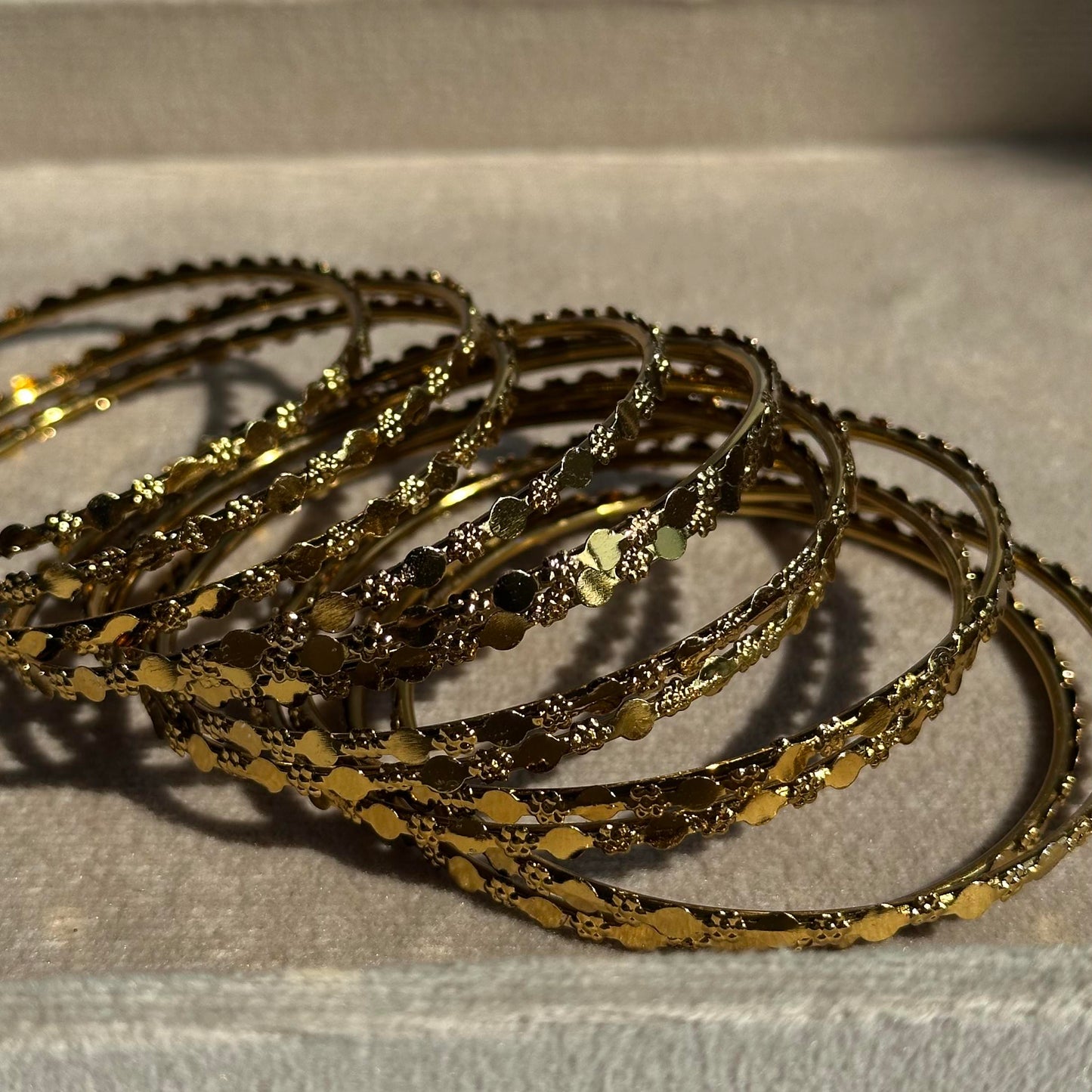 12-Piece Gold Embossed Traditional Churi Bangle Set